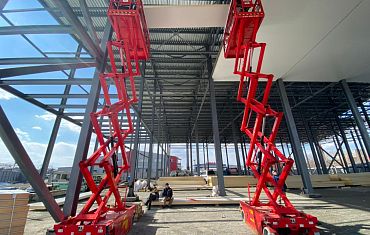 Устройство, виды и сферы применения ножничных подъемников